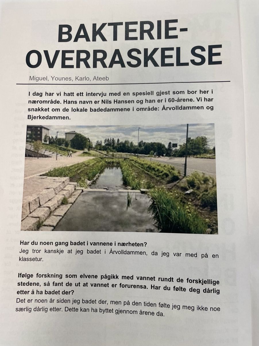 En avisartikkel med vei og bygninger